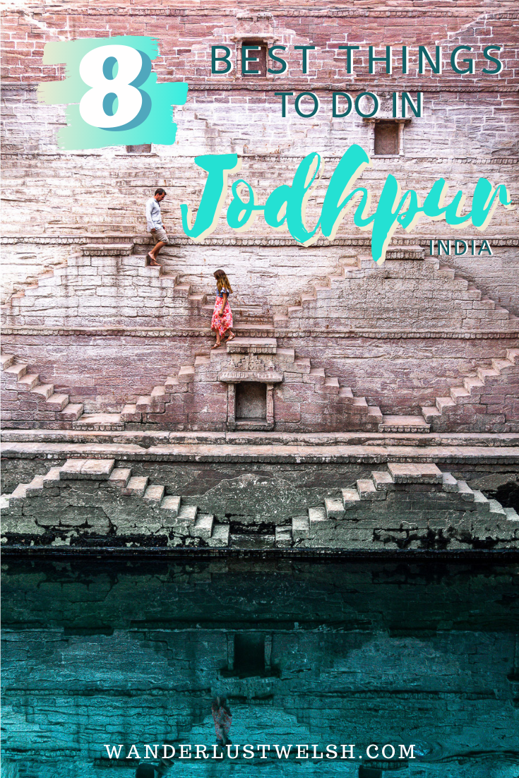 Two People Walk Down the Toorji Ka Jhalra Bavdi Stepwell