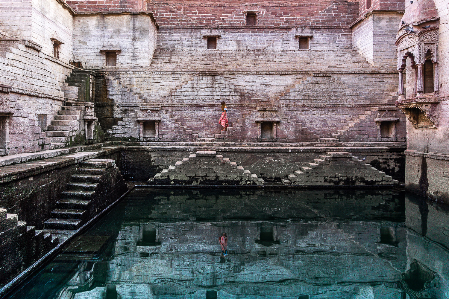 Girl Walking in Toorji Ka Jhalra Bavdi Stepwell in Jodhpur