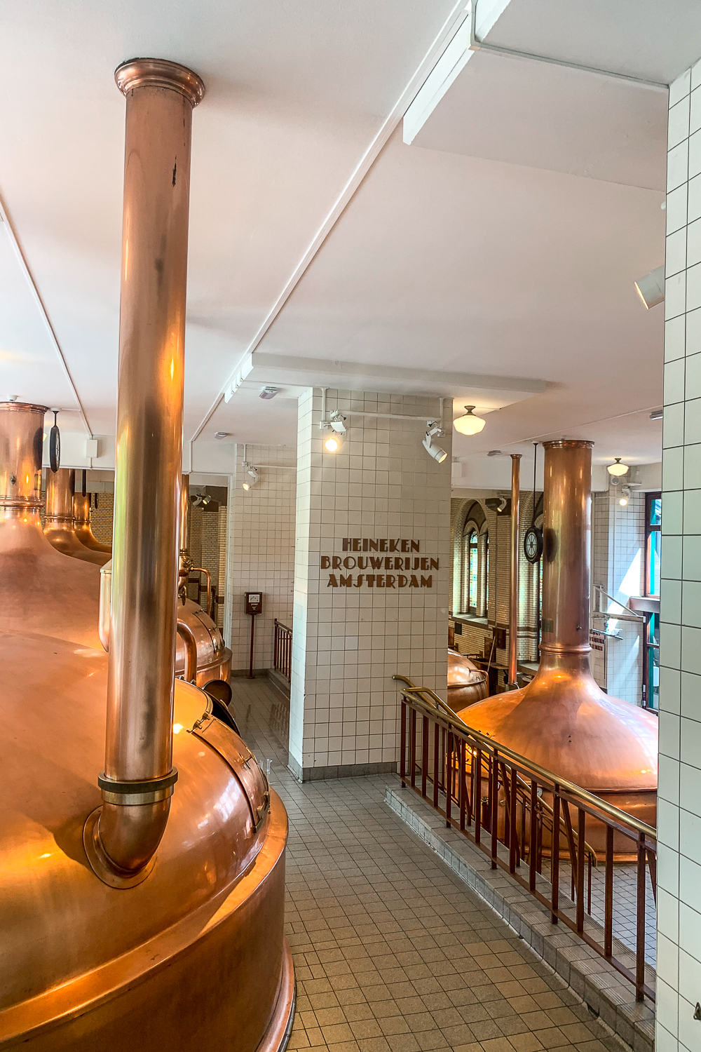 Inside the Heineken brewery, copper brewing vats and equipment