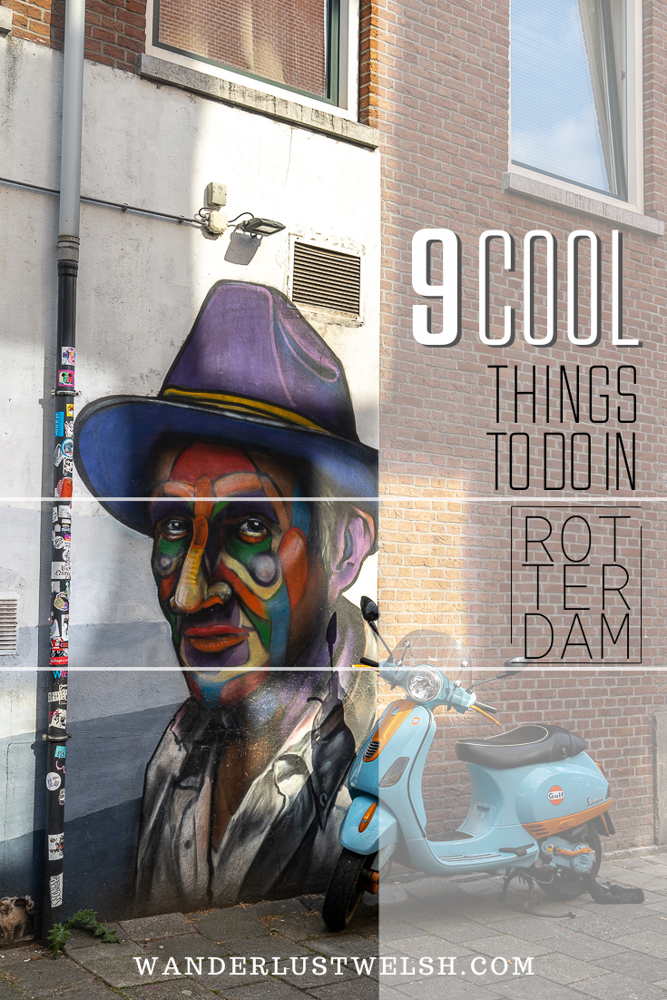 Street Art of a guy in a fedora - Vespa chained up nearby