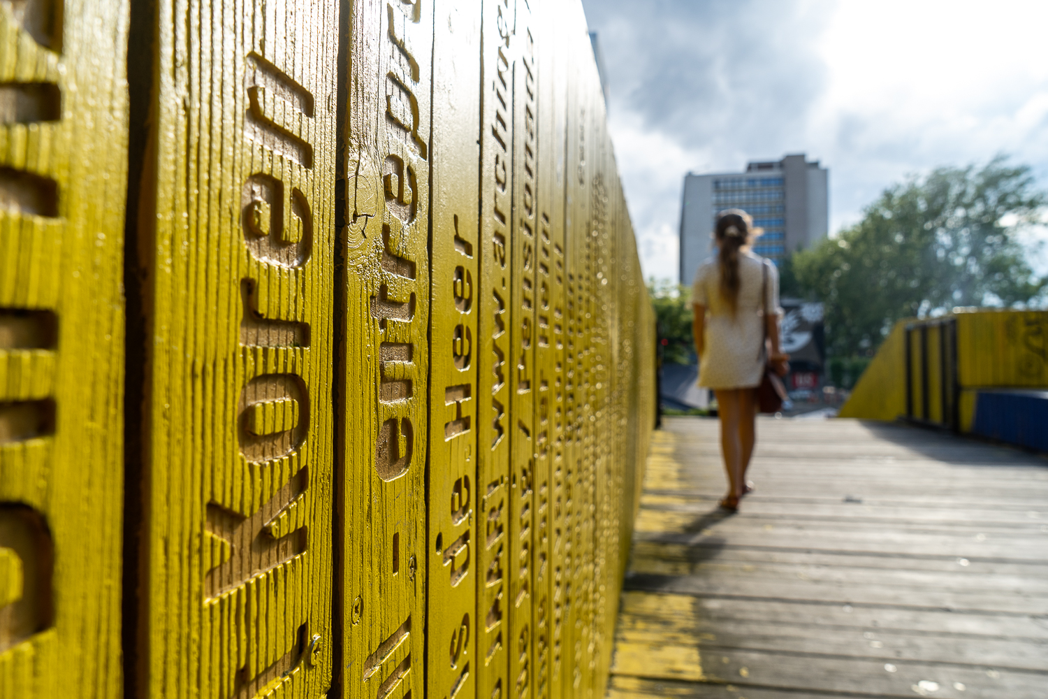 Yellow bridge, detailed grainy wood with Dutch writing