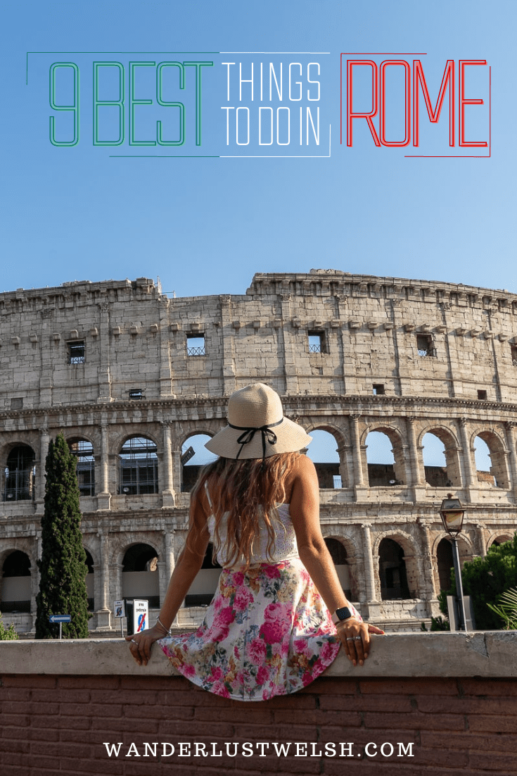 A woman sitting on a ledge admiring the Colosseum in Rome.