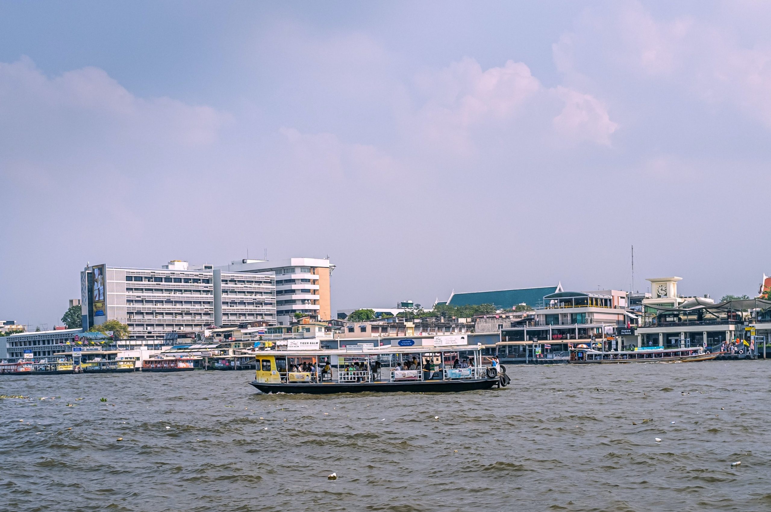 A wide view of a river ferry boat on the river Chao Phraya in Bangkok