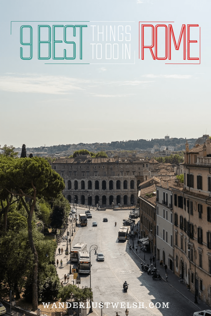 A city street in Rome lined with buildings and trees.