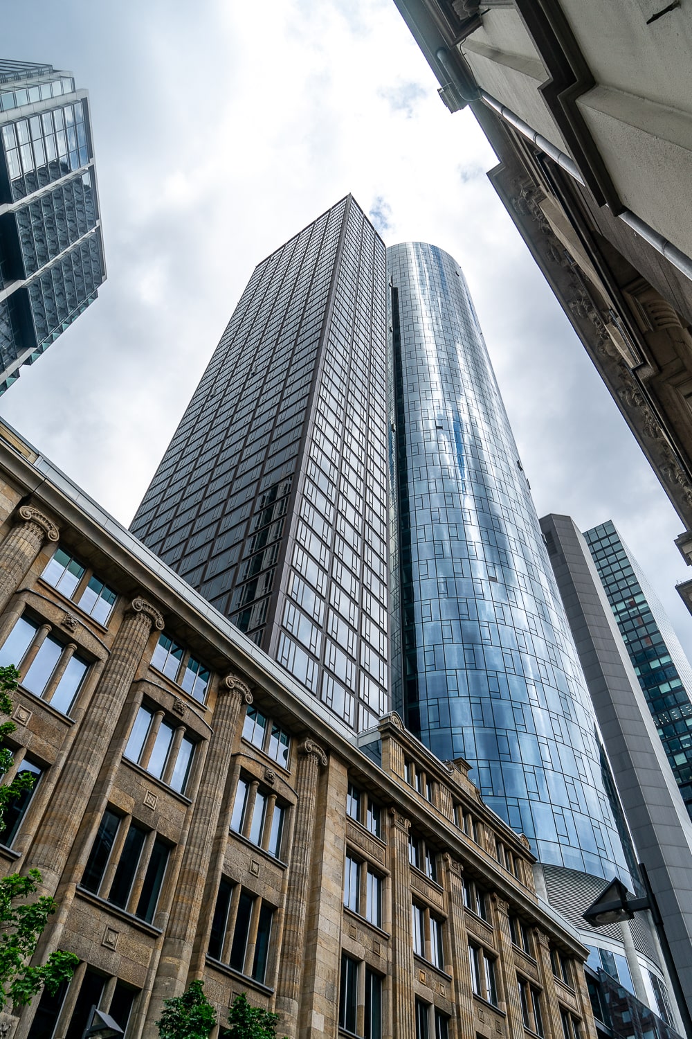 A huge glass skyscraper against the sky