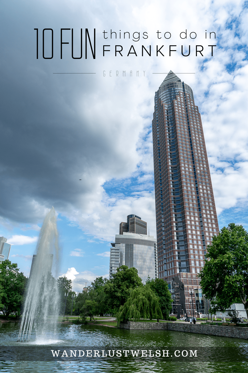 The Messeturm skyscraper in Frankfurt with large fountain and lake