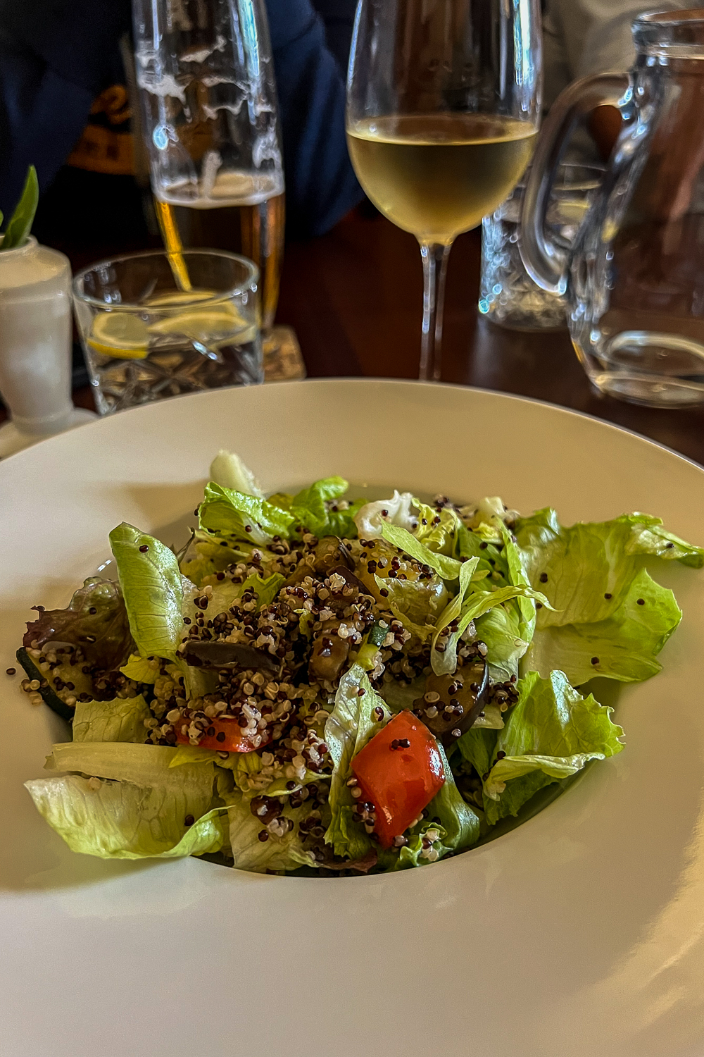 Salad and white wine in A Fortna Restaurant