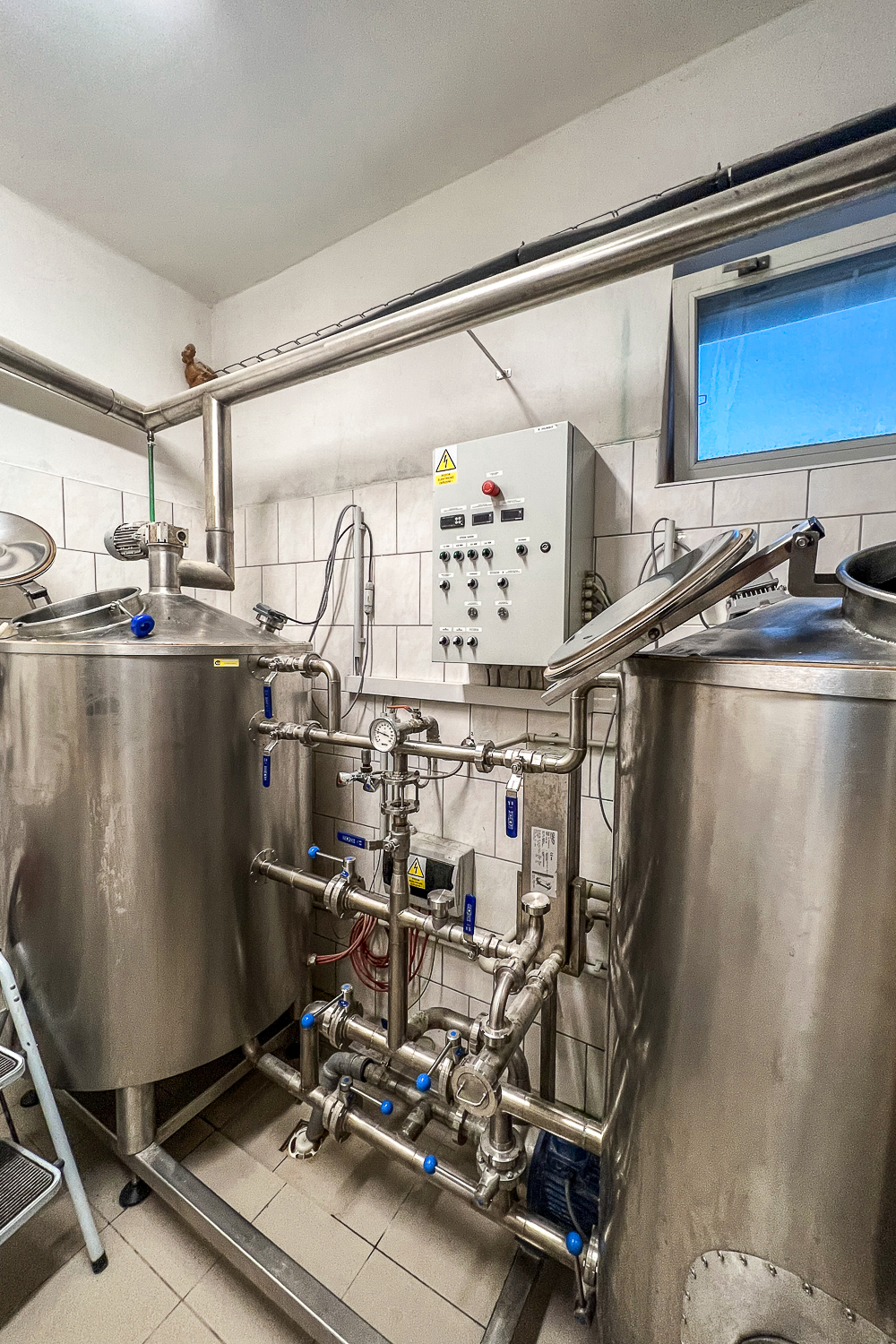 A Microbrewery with large vats for beer making