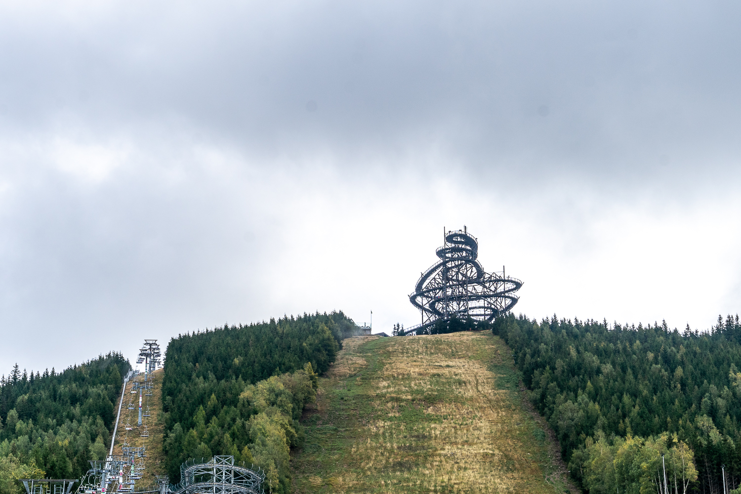 View of the alpine mountaintop, with chairlifts, coaster and sky walk