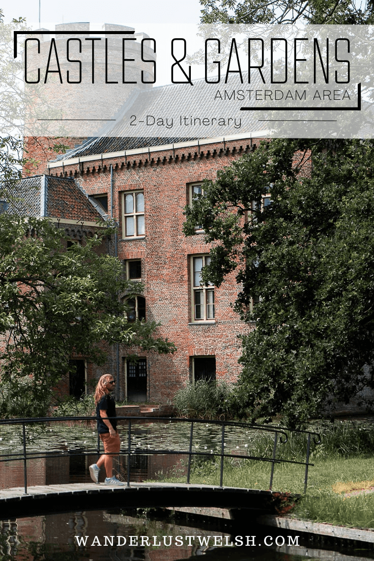 A red brick castle with a small bridge with a man standing on it set amongst trees