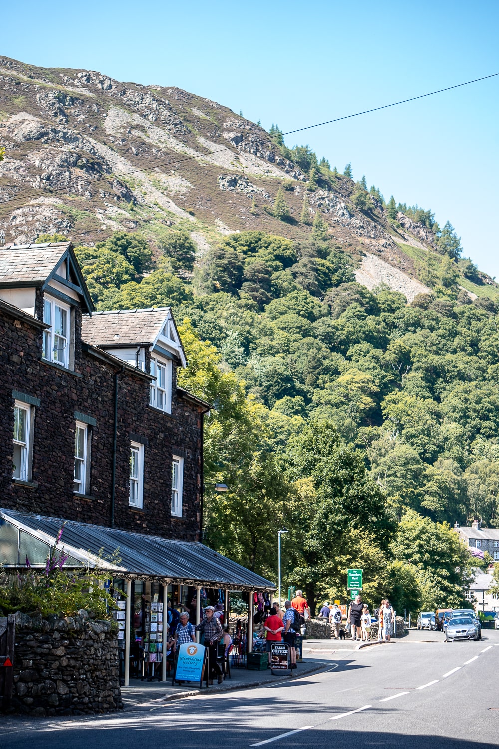 a quaint town with mountain in background