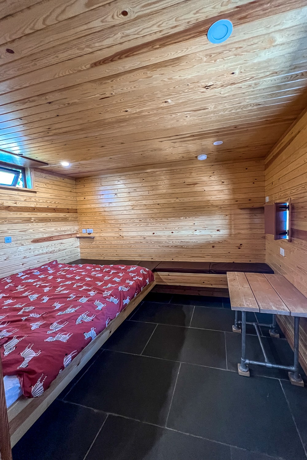 inside a wooden glamping pod