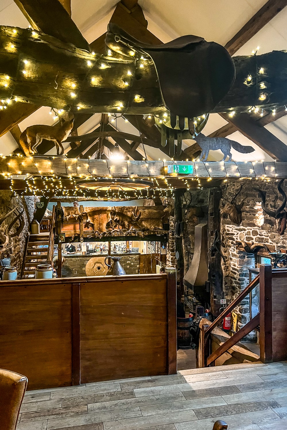 an old pub with stuffed animals and antiques