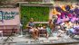 A couple sat at a cafe on Train street in Hanoi