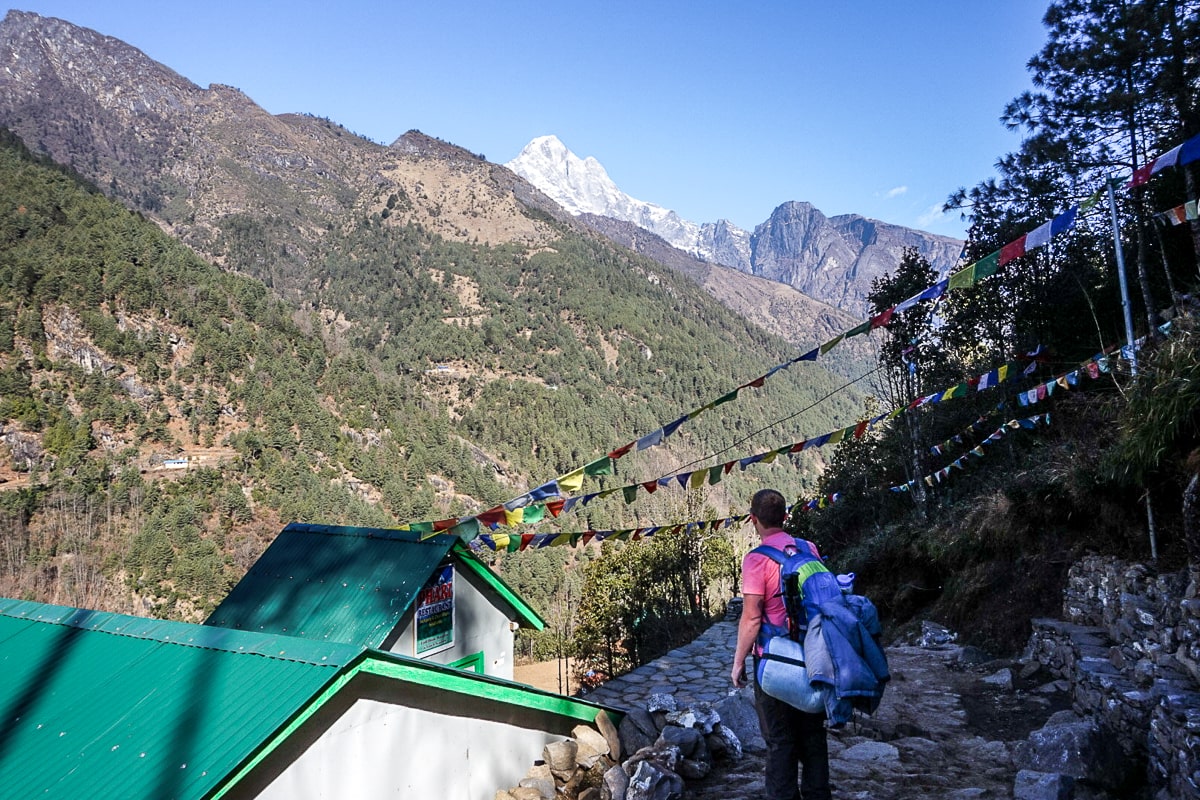 A man enjoying a view of the Khumbu valley on an Everest Base Camp trek