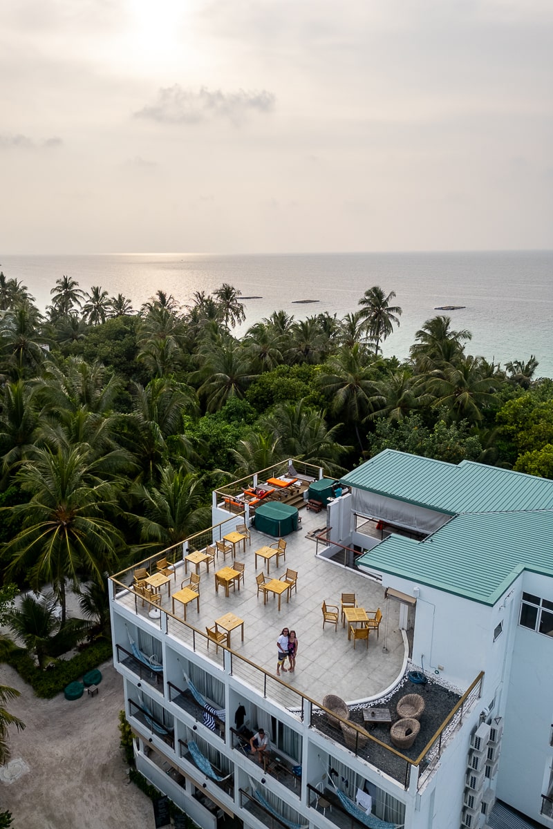 A rooftop drone shot of Bliss Hotel in Dhigurah
