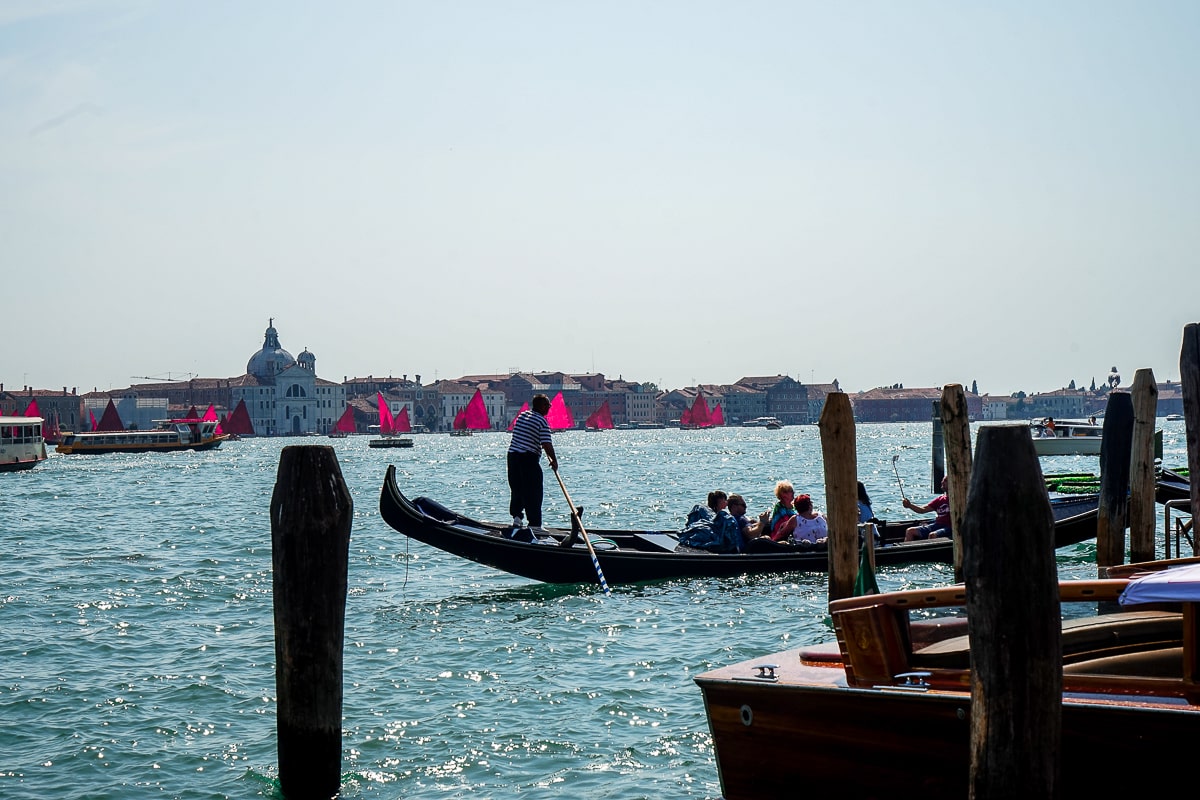 A sea view in Venice with a gondola passing by