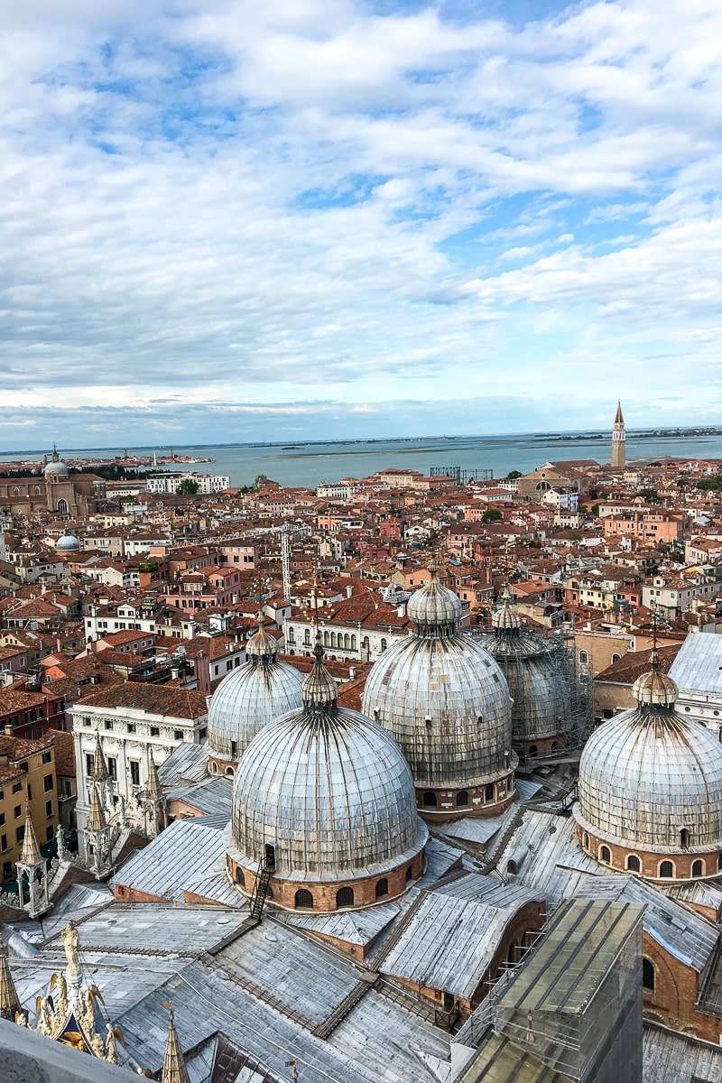 A view from St. Mark's Campanile of the rooftops - red tiled roofs and renaissance domes