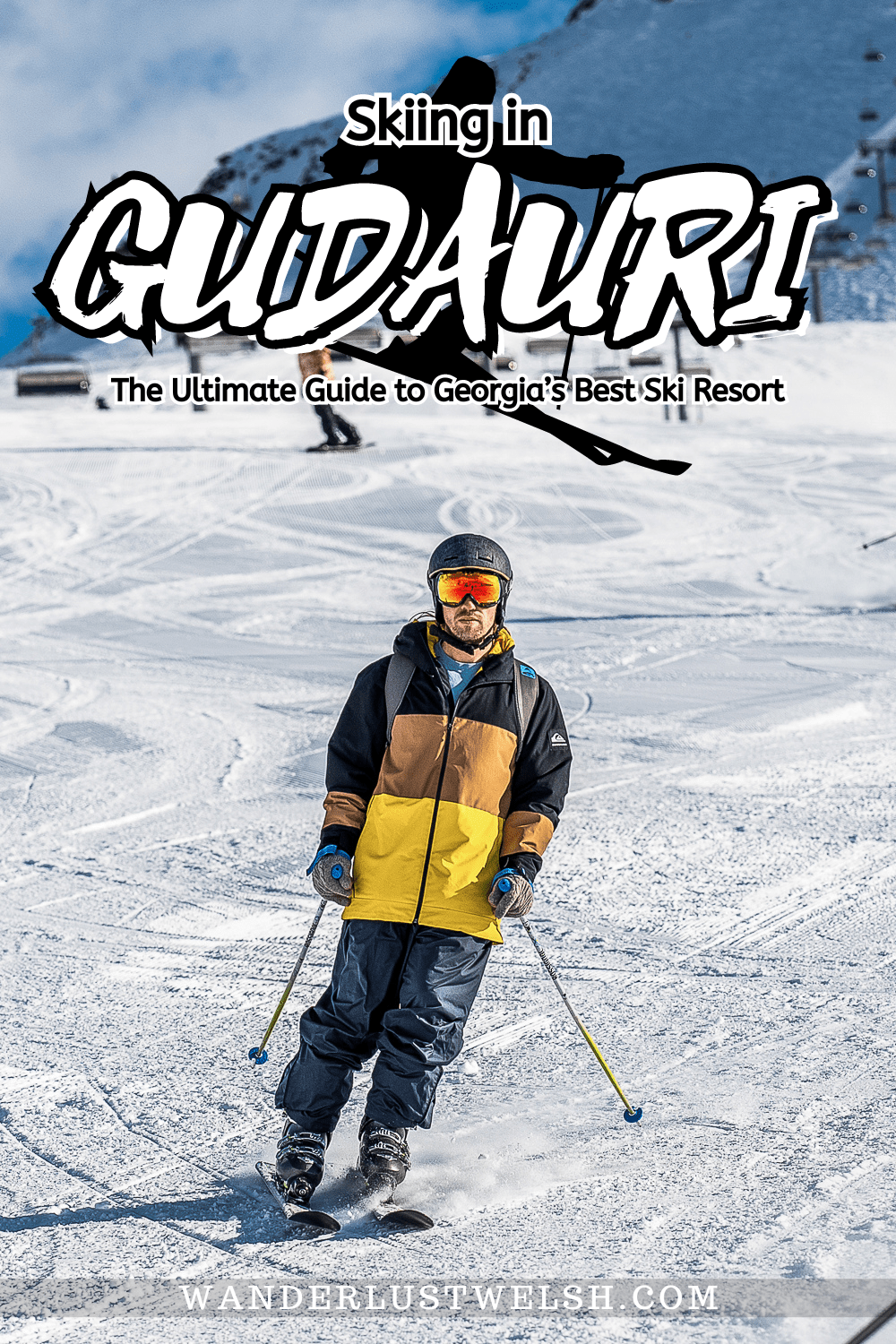 A man coming to a stop on skis on a freshly groomed ski slope