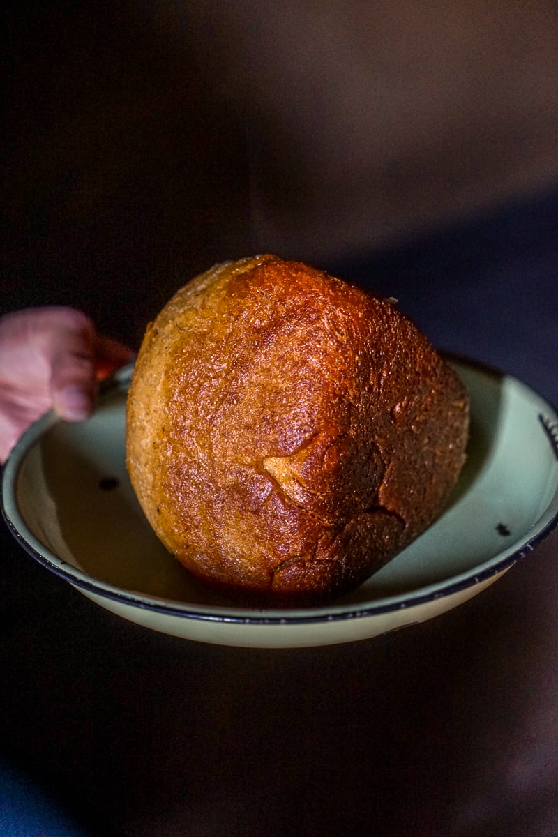 A round piece of bread from a larger tear and share loaf