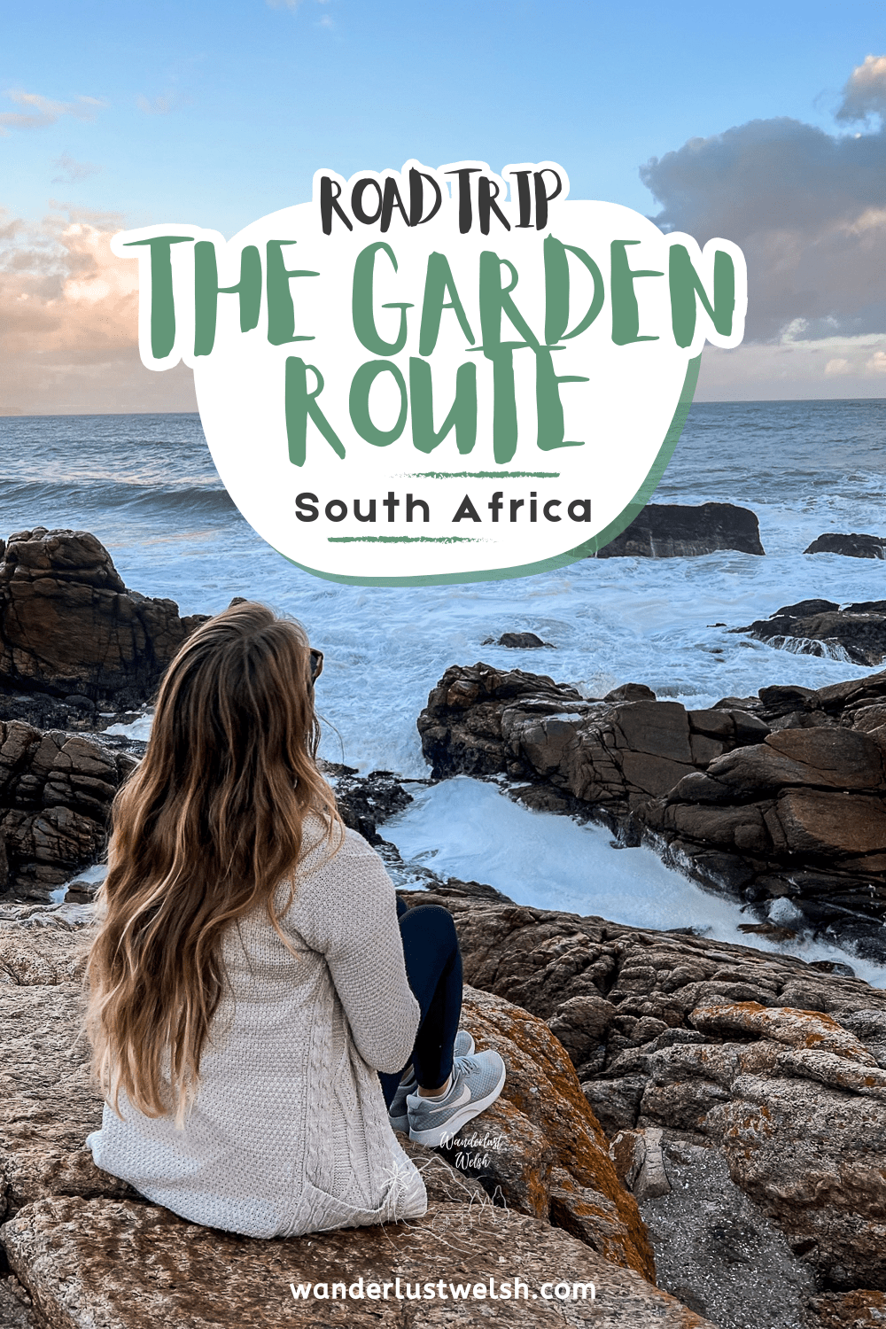 A woman sat on the rocks overlooking rough sea with the words "Road Trip The Garden Route" superimposed