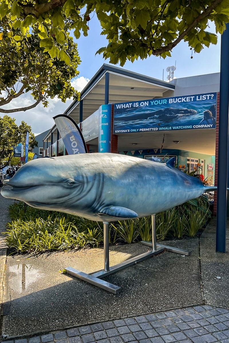 A blue-and-white whale sculpture