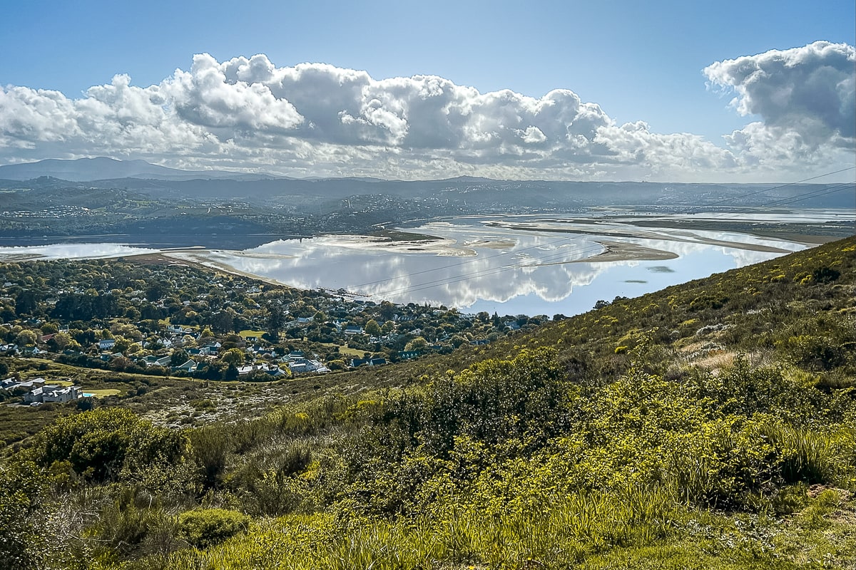 A large estuary with buildings dotted around