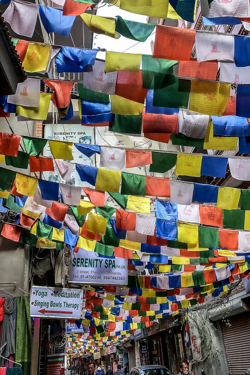 Colourful prayer flags hanging above a street in Kathmandu