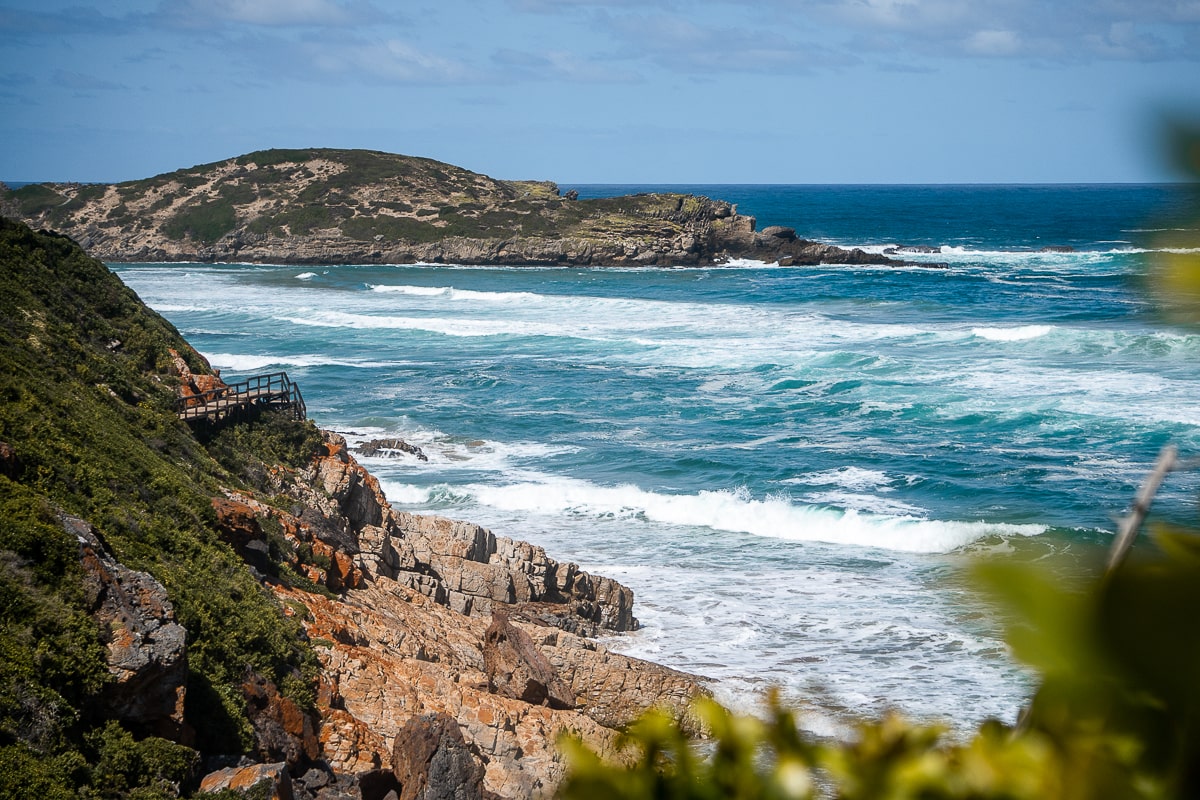 A view of the choppy sea on a rocky shoreline