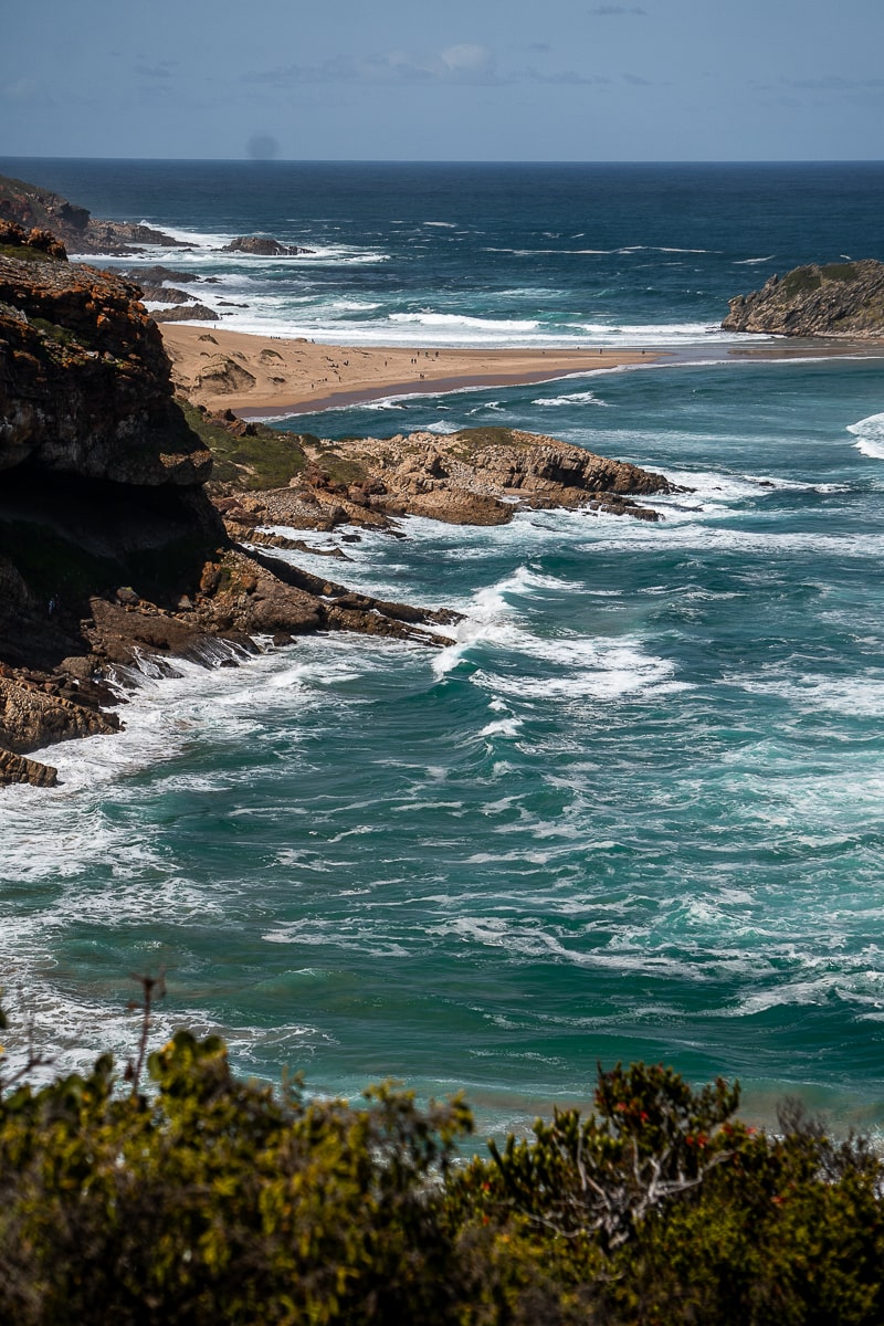 A choppy sea crashing against rocks