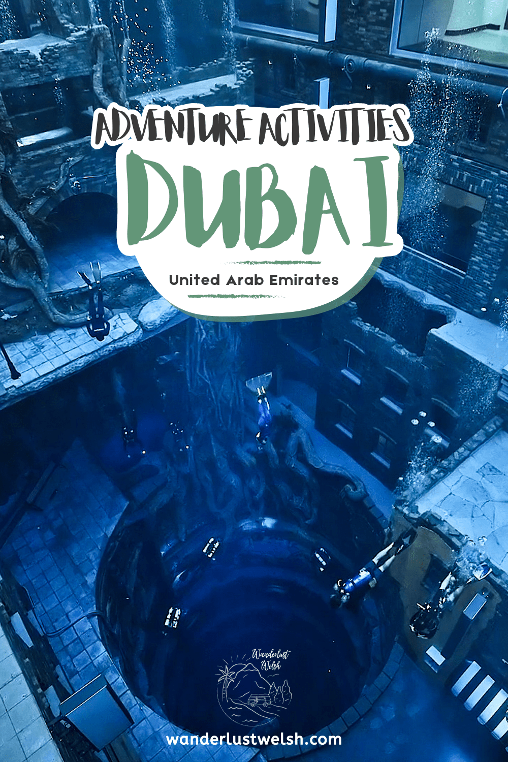 An indoor dive pool with deep central chamber themed as a sunken city with the words "Adventure activities Dubai" superimposed