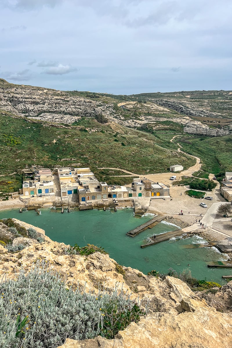 A small fishing village on the coast seen from a mountain