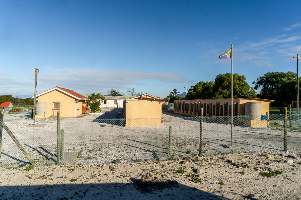 A set of long rows of prison cells