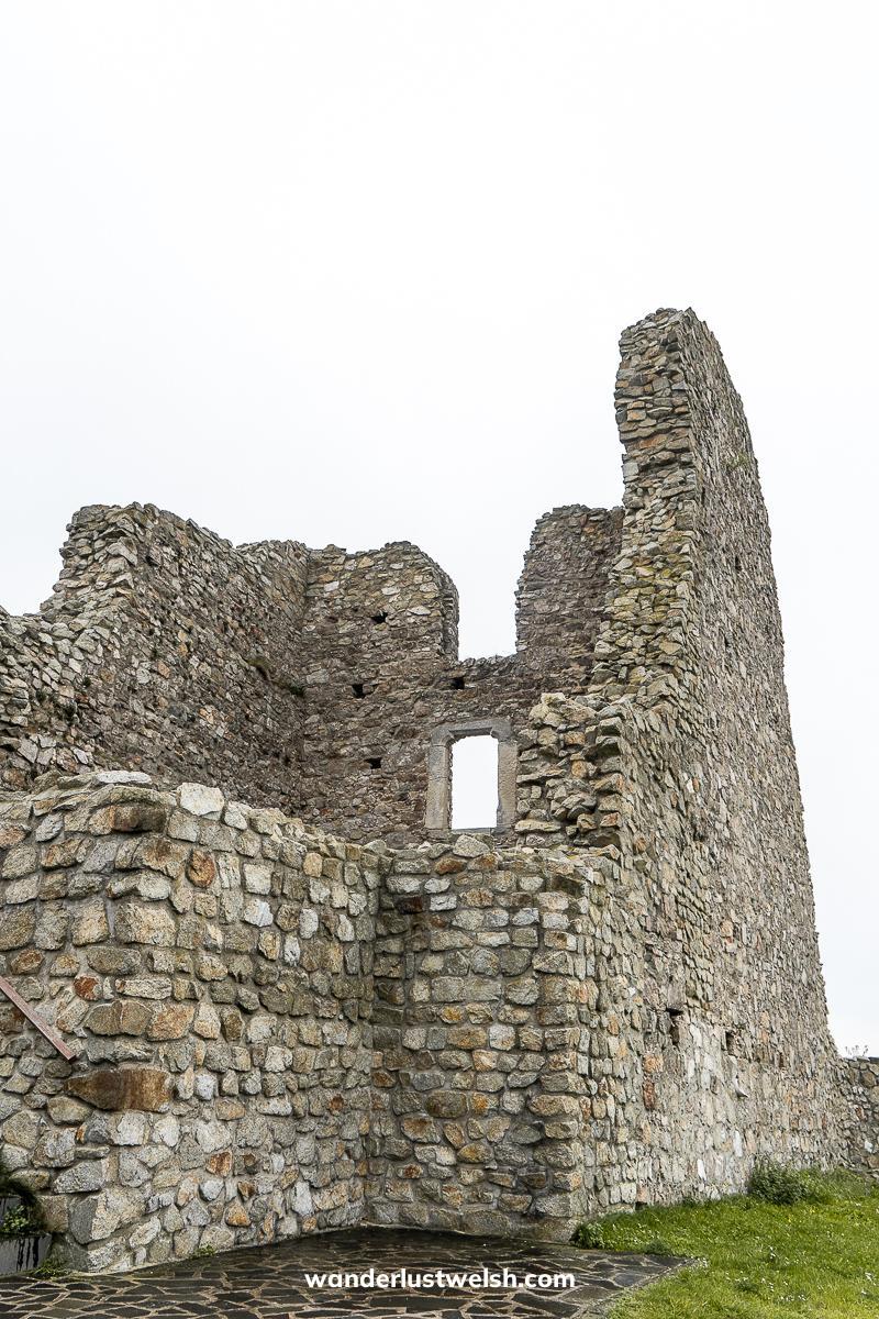 A partially ruined castle wall