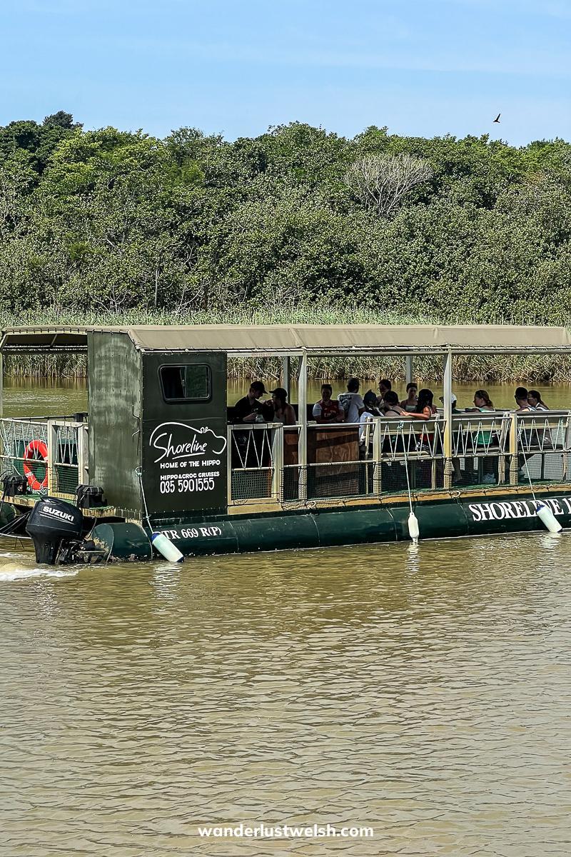 A small cruise boat for hippo viewing in St Lucia, South Africa