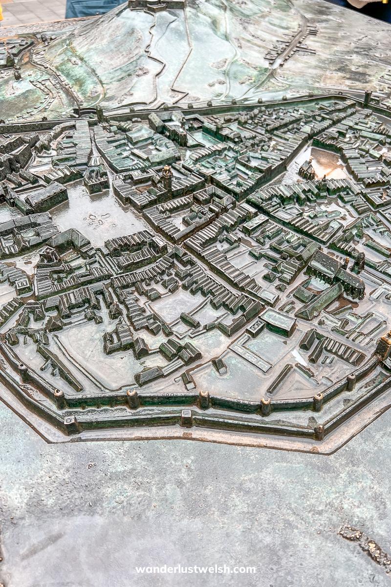 A bronze sculpture of a map of Brno