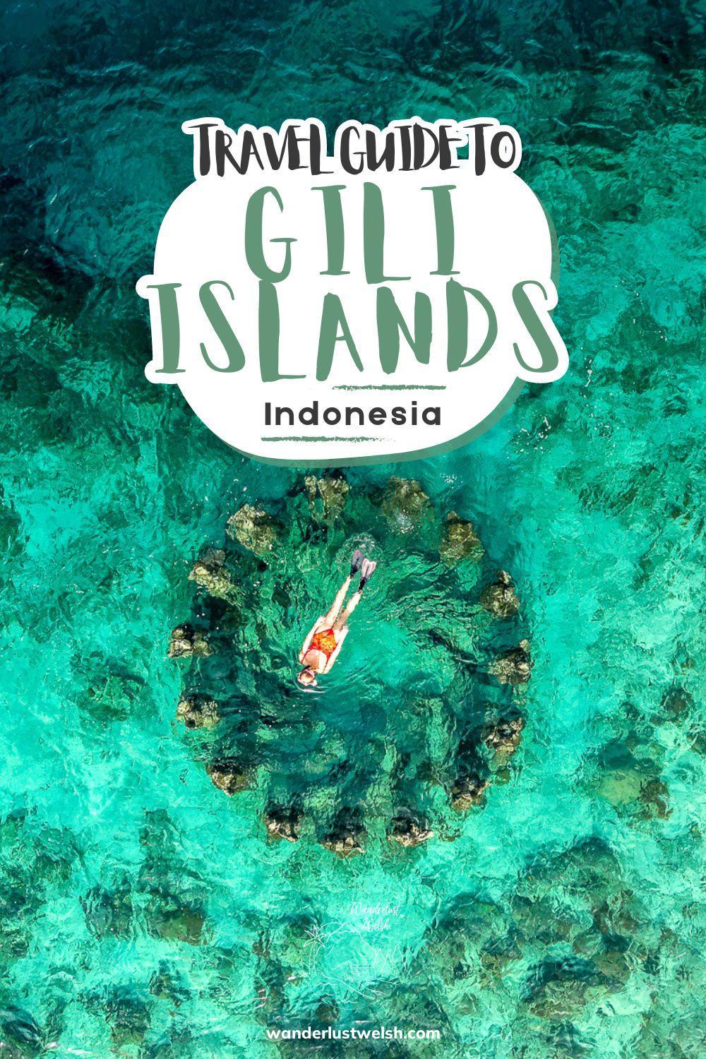 A drone shot of a woman swimming across the centre of a ring of underwater statues with the words "Travel Guide to Gili Islands" superimposed