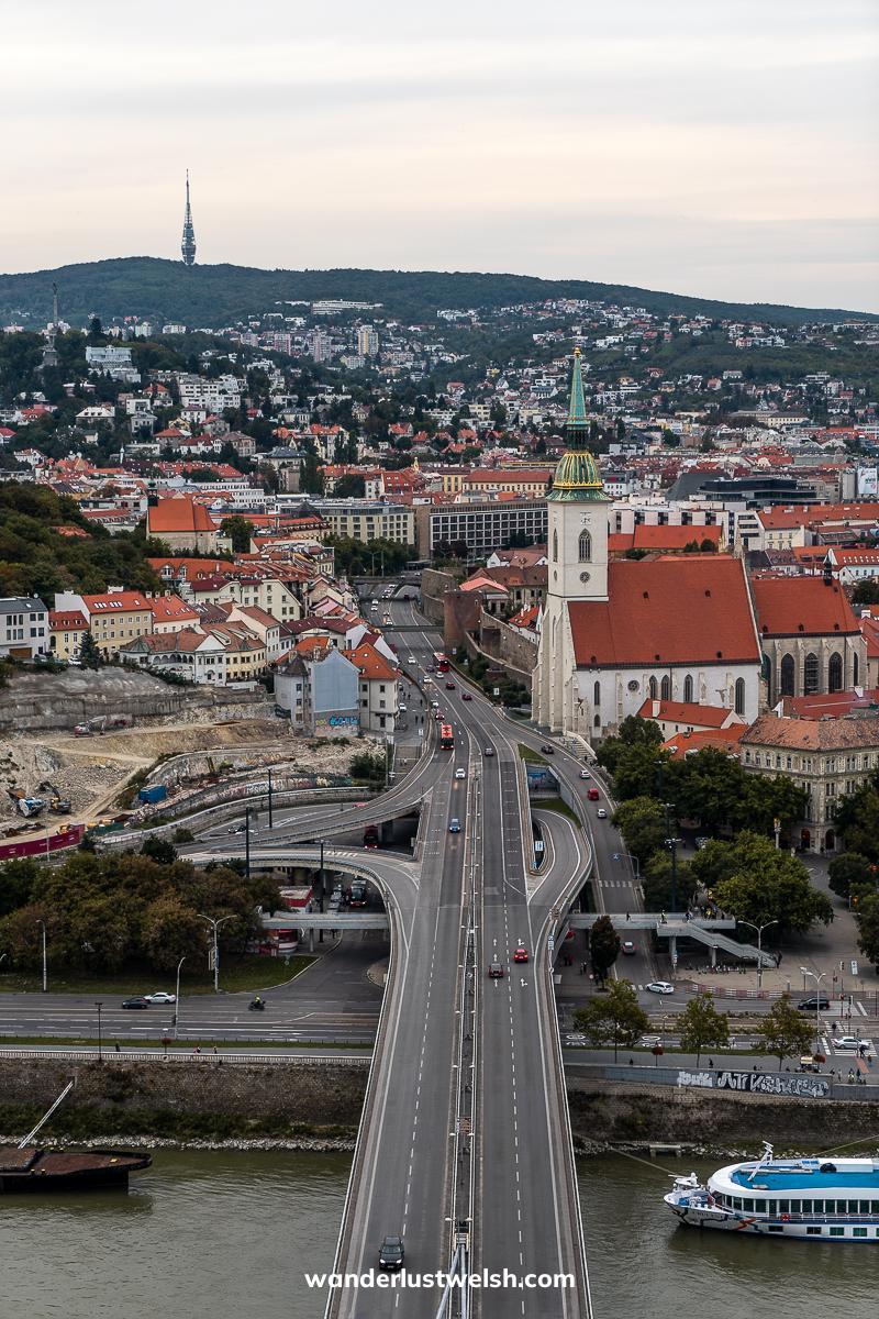 Aerial view of some of Bratislava - a church and a bridge over the Danube