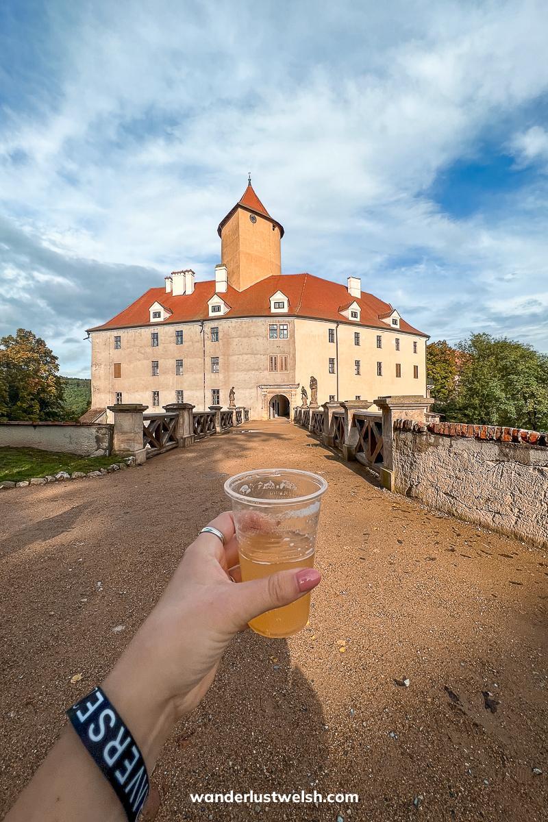 Veveri Castle - A beige colored castle with orange roof and tower