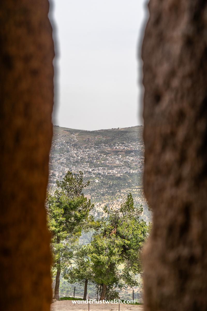 A view of the northern Jordan hillsides from an arrowslit