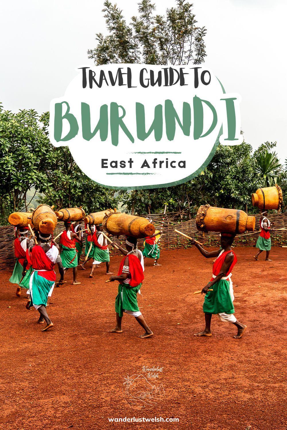 Gitega drummers in colorful outfits with the words "Travel Guide to Burundi" superimposed