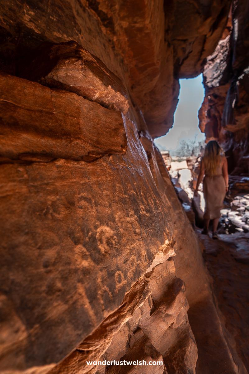 Rock carved petroglyphs in a gorge in the Jordan desert