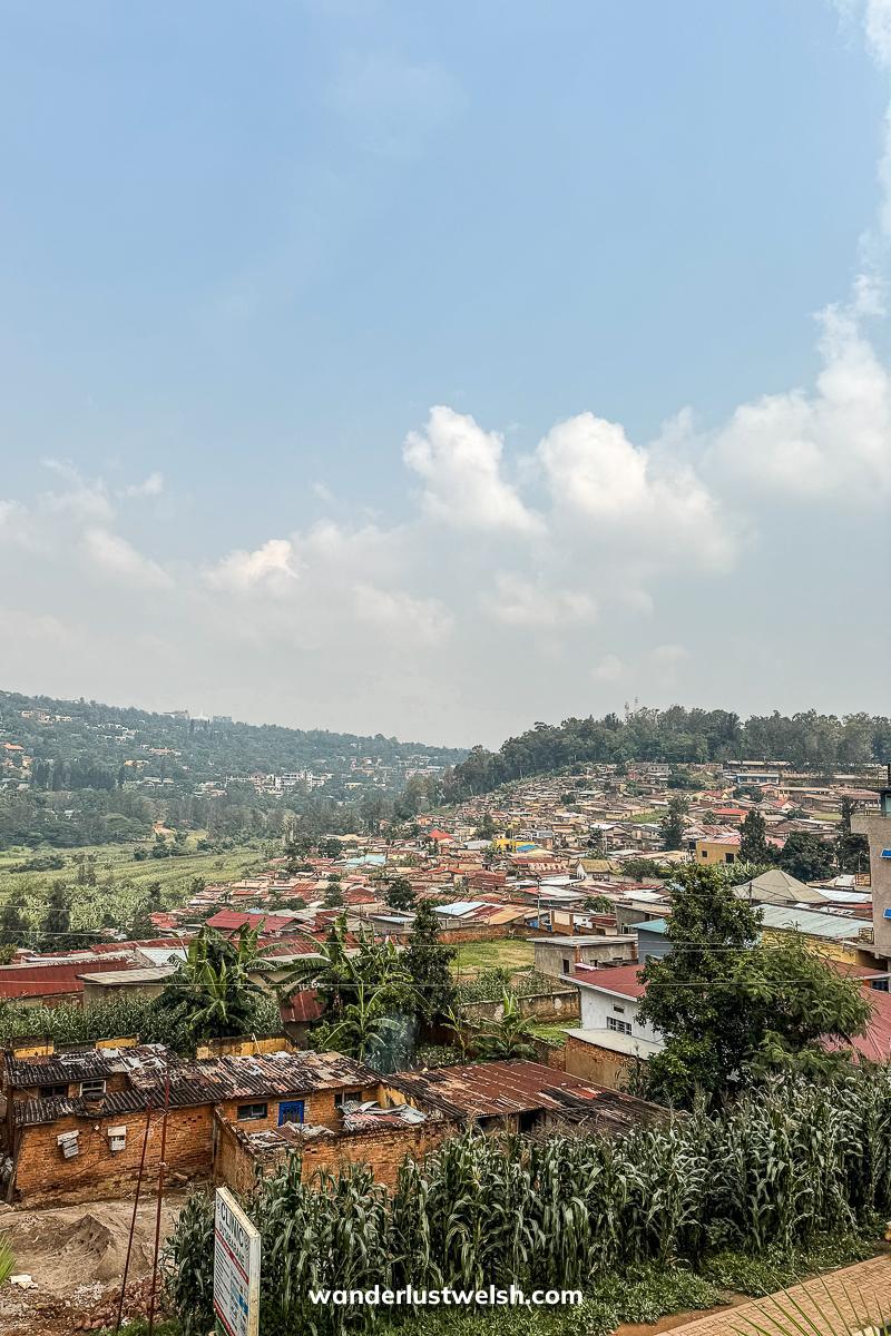 A more rural part of Kigali with basic houses and farmlands