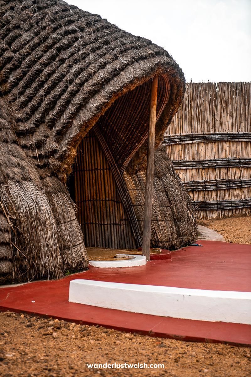 The doorway to a traditional King's palace in Rwanda - wicker house