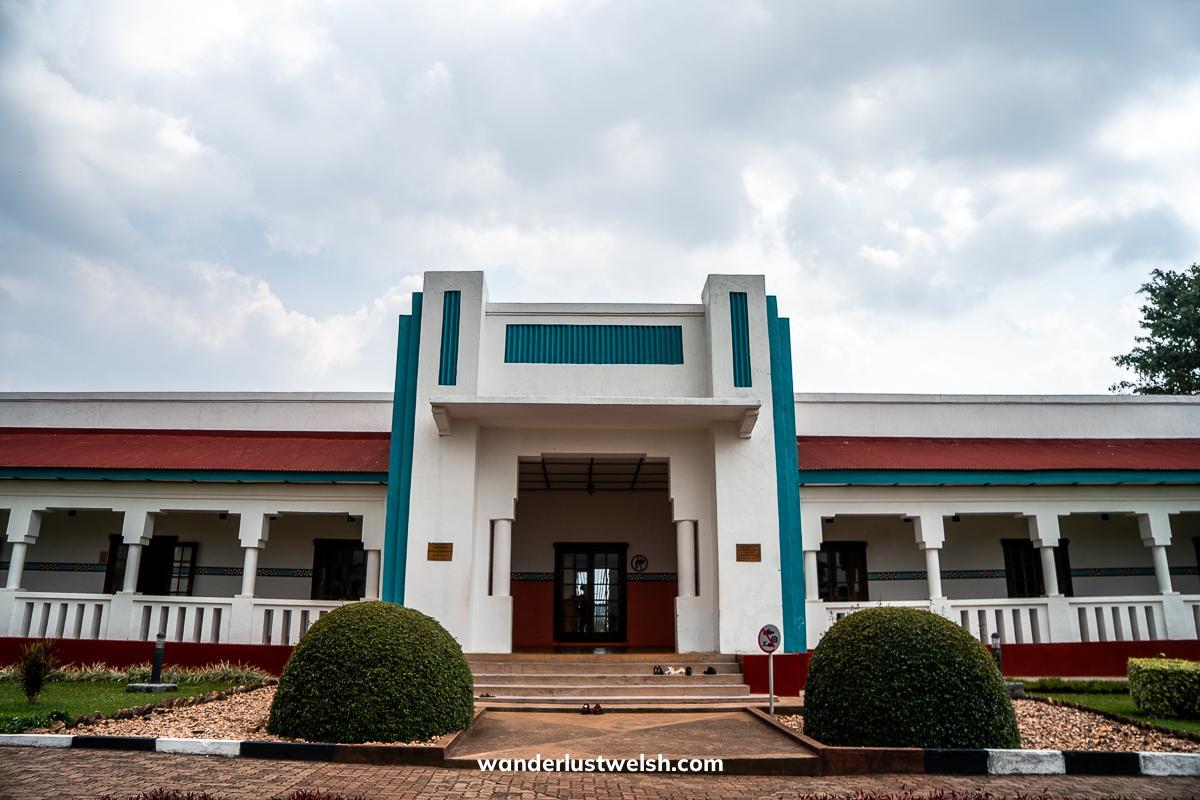 Rwanda King's palace - a white and blue building