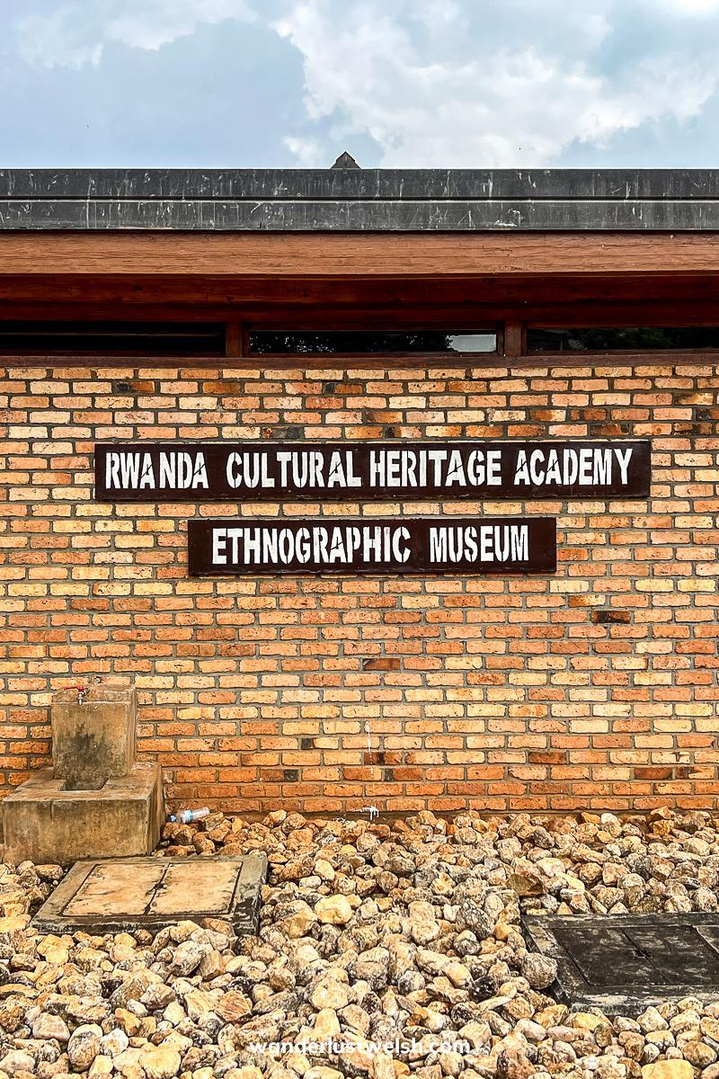 A brick wall with the sign "Rwanda Cultural Heritage Academy Ethnographic Museum"
